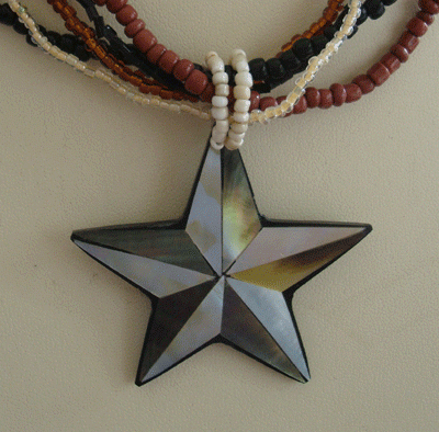 Black Shell Carving With Bead